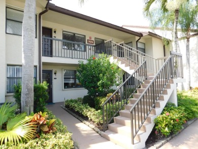 2 bedroom, 2 bath second floor unit with view of lake. Eat in on Forest Oaks Golf Club in Florida - for sale on GolfHomes.com, golf home, golf lot