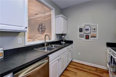 Welcome to this well-maintained 2-bedroom, 2.5-bath townhome on Williamsburg National Golf Club in Virginia - for sale on GolfHomes.com, golf home, golf lot