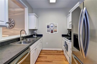 Welcome to this well-maintained 2-bedroom, 2.5-bath townhome on Williamsburg National Golf Club in Virginia - for sale on GolfHomes.com, golf home, golf lot