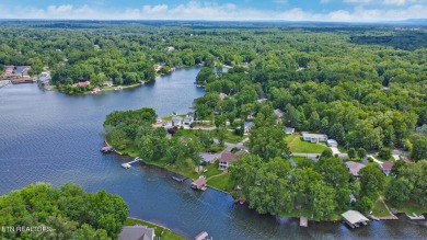 Wake up every morning to a beautiful lake view in this fully on Lake Tansi Village Country Club in Tennessee - for sale on GolfHomes.com, golf home, golf lot