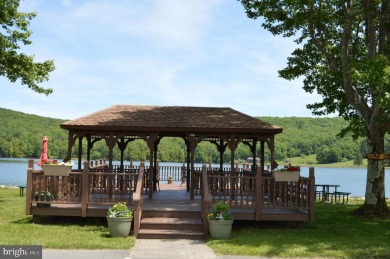 Discover your PERFECT Lake Access Getaway in the Serene Alpine on Alpine Lake Resort in West Virginia - for sale on GolfHomes.com, golf home, golf lot