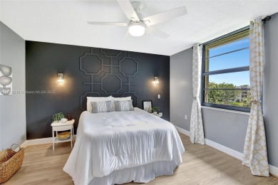 Beautifully updated & artist-decorated 2-bed, 2-bath condo with on Pine Island Ridge Country Club in Florida - for sale on GolfHomes.com, golf home, golf lot