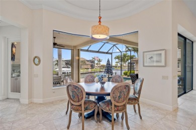 PUNTA GORDA ISLES!! STUNNING 3 BEDROOM PLUS DEN, 3 BATH, 3 CAR on Saint Andrews South Golf Club in Florida - for sale on GolfHomes.com, golf home, golf lot