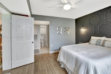Beautifully updated & artist-decorated 2-bed, 2-bath condo with on Pine Island Ridge Country Club in Florida - for sale on GolfHomes.com, golf home, golf lot