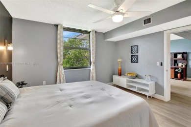 Beautifully updated & artist-decorated 2-bed, 2-bath condo with on Pine Island Ridge Country Club in Florida - for sale on GolfHomes.com, golf home, golf lot