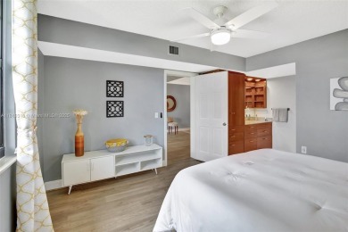 Beautifully updated & artist-decorated 2-bed, 2-bath condo with on Pine Island Ridge Country Club in Florida - for sale on GolfHomes.com, golf home, golf lot