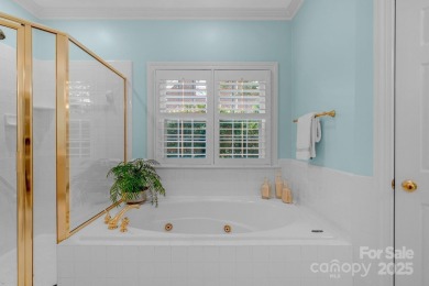 Stunning full-brick estate overlooking Ballantyne Country Club's on Ballantyne Resort and Country Club in North Carolina - for sale on GolfHomes.com, golf home, golf lot