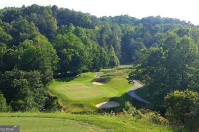 This lot offers great mountain views and Sky Valley city on Sky Valley Resort and Country Club in Georgia - for sale on GolfHomes.com, golf home, golf lot
