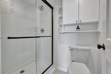 Beautifully updated & artist-decorated 2-bed, 2-bath condo with on Pine Island Ridge Country Club in Florida - for sale on GolfHomes.com, golf home, golf lot