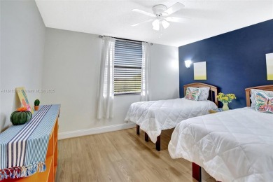 Beautifully updated & artist-decorated 2-bed, 2-bath condo with on Pine Island Ridge Country Club in Florida - for sale on GolfHomes.com, golf home, golf lot