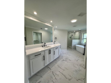 Completely renovated in 2024, 4 BR/2.5 bath/Huge garage on Evergreen Club in Florida - for sale on GolfHomes.com, golf home, golf lot