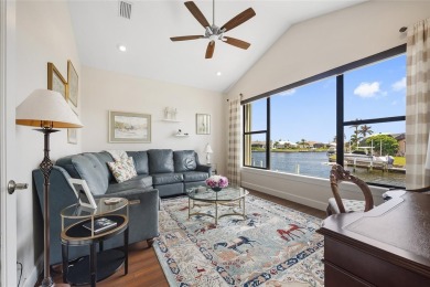 PUNTA GORDA ISLES!! STUNNING 3 BEDROOM PLUS DEN, 3 BATH, 3 CAR on Saint Andrews South Golf Club in Florida - for sale on GolfHomes.com, golf home, golf lot