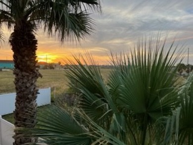 Escape to your tropical beach home away from home, just a on Palmilla Beach Golf Club in Texas - for sale on GolfHomes.com, golf home, golf lot