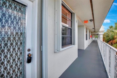 Beautifully updated & artist-decorated 2-bed, 2-bath condo with on Pine Island Ridge Country Club in Florida - for sale on GolfHomes.com, golf home, golf lot
