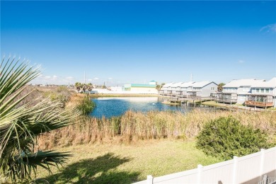 Escape to your tropical beach home away from home, just a on Palmilla Beach Golf Club in Texas - for sale on GolfHomes.com, golf home, golf lot