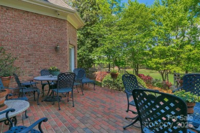 Stunning full-brick estate overlooking Ballantyne Country Club's on Ballantyne Resort and Country Club in North Carolina - for sale on GolfHomes.com, golf home, golf lot