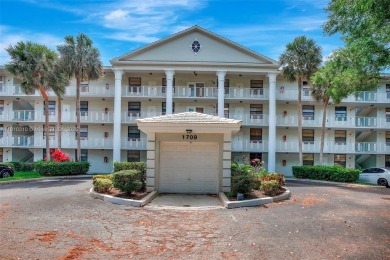 Beautifully updated & artist-decorated 2-bed, 2-bath condo with on Pine Island Ridge Country Club in Florida - for sale on GolfHomes.com, golf home, golf lot