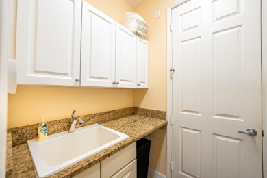 Welcome to 8821 Champions Way, a fully turn-key home in the on PGA Golf Club in PGA Village in Florida - for sale on GolfHomes.com, golf home, golf lot