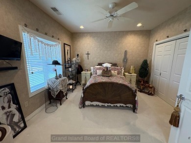 Beautiful condo overlooking the 18th fairway of Riverside Golf on Riverside Country Club in Nebraska - for sale on GolfHomes.com, golf home, golf lot
