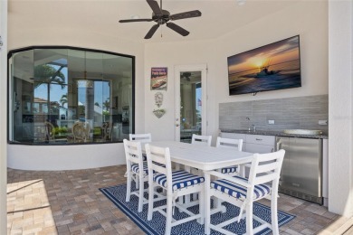 PUNTA GORDA ISLES!! STUNNING 3 BEDROOM PLUS DEN, 3 BATH, 3 CAR on Saint Andrews South Golf Club in Florida - for sale on GolfHomes.com, golf home, golf lot