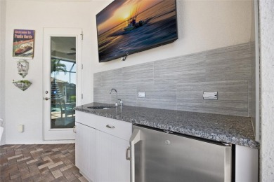 PUNTA GORDA ISLES!! STUNNING 3 BEDROOM PLUS DEN, 3 BATH, 3 CAR on Saint Andrews South Golf Club in Florida - for sale on GolfHomes.com, golf home, golf lot