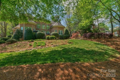 Stunning full-brick estate overlooking Ballantyne Country Club's on Ballantyne Resort and Country Club in North Carolina - for sale on GolfHomes.com, golf home, golf lot