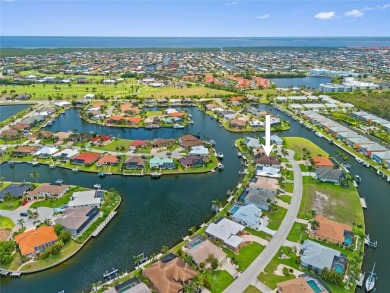 PUNTA GORDA ISLES!! STUNNING 3 BEDROOM PLUS DEN, 3 BATH, 3 CAR on Saint Andrews South Golf Club in Florida - for sale on GolfHomes.com, golf home, golf lot