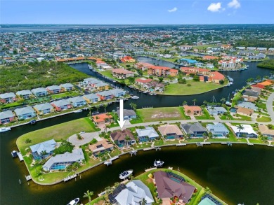 PUNTA GORDA ISLES!! STUNNING 3 BEDROOM PLUS DEN, 3 BATH, 3 CAR on Saint Andrews South Golf Club in Florida - for sale on GolfHomes.com, golf home, golf lot