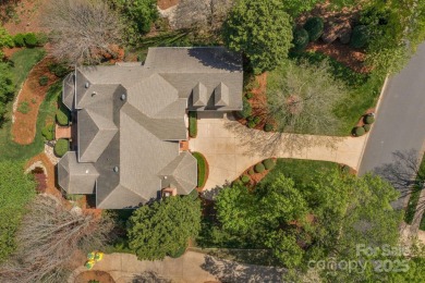 Stunning full-brick estate overlooking Ballantyne Country Club's on Ballantyne Resort and Country Club in North Carolina - for sale on GolfHomes.com, golf home, golf lot