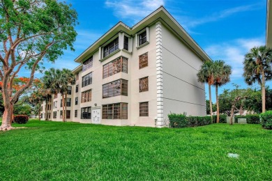 Beautifully updated & artist-decorated 2-bed, 2-bath condo with on Pine Island Ridge Country Club in Florida - for sale on GolfHomes.com, golf home, golf lot