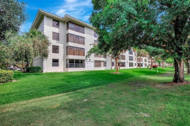 Beautifully updated & artist-decorated 2-bed, 2-bath condo with on Pine Island Ridge Country Club in Florida - for sale on GolfHomes.com, golf home, golf lot