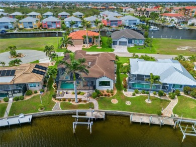 PUNTA GORDA ISLES!! STUNNING 3 BEDROOM PLUS DEN, 3 BATH, 3 CAR on Saint Andrews South Golf Club in Florida - for sale on GolfHomes.com, golf home, golf lot