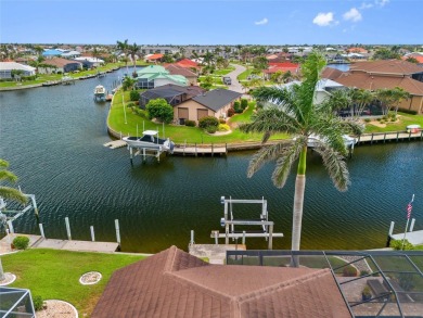 PUNTA GORDA ISLES!! STUNNING 3 BEDROOM PLUS DEN, 3 BATH, 3 CAR on Saint Andrews South Golf Club in Florida - for sale on GolfHomes.com, golf home, golf lot