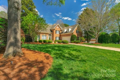 Stunning full-brick estate overlooking Ballantyne Country Club's on Ballantyne Resort and Country Club in North Carolina - for sale on GolfHomes.com, golf home, golf lot