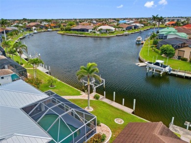 PUNTA GORDA ISLES!! STUNNING 3 BEDROOM PLUS DEN, 3 BATH, 3 CAR on Saint Andrews South Golf Club in Florida - for sale on GolfHomes.com, golf home, golf lot