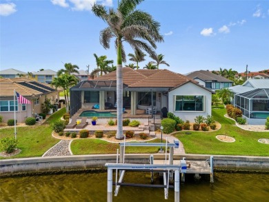 PUNTA GORDA ISLES!! STUNNING 3 BEDROOM PLUS DEN, 3 BATH, 3 CAR on Saint Andrews South Golf Club in Florida - for sale on GolfHomes.com, golf home, golf lot