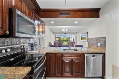 Welcome to this beautiful updated 2-bedroom, 2 bathroom condo in on The Country Club At Boca Raton in Florida - for sale on GolfHomes.com, golf home, golf lot