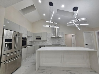 Modern paradise in PGA National, Cul-de-sac, 4/2 pool house on PGA National Golf Club in Florida - for sale on GolfHomes.com, golf home, golf lot