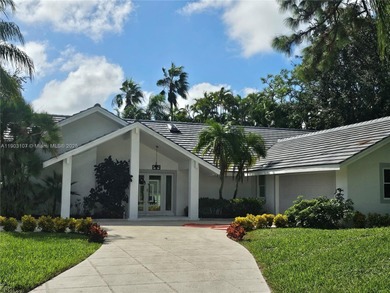 Modern paradise in PGA National, Cul-de-sac, 4/2 pool house on PGA National Golf Club in Florida - for sale on GolfHomes.com, golf home, golf lot