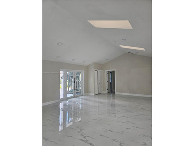 Modern paradise in PGA National, Cul-de-sac, 4/2 pool house on PGA National Golf Club in Florida - for sale on GolfHomes.com, golf home, golf lot