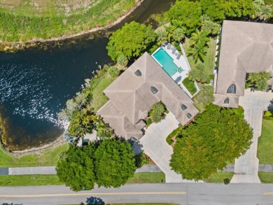 Secluded Waterfront Living in Palm Beach Polo-Tucked away on one on Palm Beach Polo and Country Club in Florida - for sale on GolfHomes.com, golf home, golf lot
