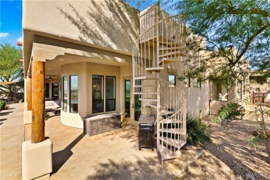 This stunning 5-bedroom, 4-bathroom custom home, built in 2011 on Laughlin Ranch Golf Club in Arizona - for sale on GolfHomes.com, golf home, golf lot