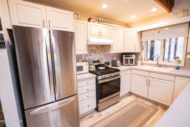 Welcome to this spacious and bright contemporary home in the on The Hideout Golf in Pennsylvania - for sale on GolfHomes.com, golf home, golf lot