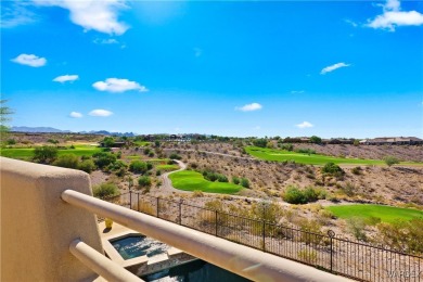 This stunning 5-bedroom, 4-bathroom custom home, built in 2011 on Laughlin Ranch Golf Club in Arizona - for sale on GolfHomes.com, golf home, golf lot