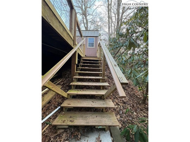 An upgraded RV LOT like no other in Land Harbor. Deck and Bunk on Land Harbor Golf Course in North Carolina - for sale on GolfHomes.com, golf home, golf lot