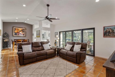 This gorgeous meticulously maintained split-bedroom home is on Woodmont Country Club in Florida - for sale on GolfHomes.com, golf home, golf lot