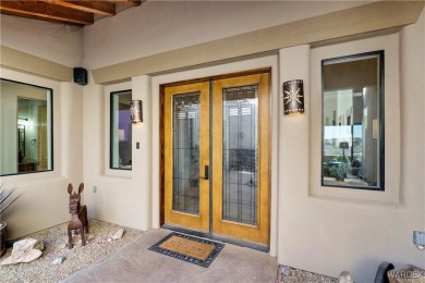 This stunning 5-bedroom, 4-bathroom custom home, built in 2011 on Laughlin Ranch Golf Club in Arizona - for sale on GolfHomes.com, golf home, golf lot