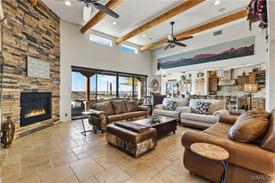 This stunning 5-bedroom, 4-bathroom custom home, built in 2011 on Laughlin Ranch Golf Club in Arizona - for sale on GolfHomes.com, golf home, golf lot