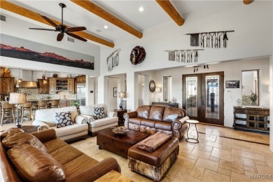 This stunning 5-bedroom, 4-bathroom custom home, built in 2011 on Laughlin Ranch Golf Club in Arizona - for sale on GolfHomes.com, golf home, golf lot