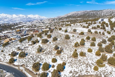 This exceptional lot sits on one of the premier streets in Red on Red Ledges Golf Club in Utah - for sale on GolfHomes.com, golf home, golf lot